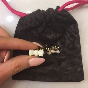 White bow kate spade earrings barely worn.